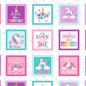 May include: A white background with a repeating pattern of colorful squares featuring unicorns and inspirational quotes. The quotes include "One of a Kind", "Dream Like a Unicorn", "Believe", "Be Unique", "Love Your Amazing Self", "Sparkle Like a Unicorn", "Inspire", and more.