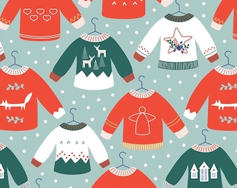 May include: A pattern of colorful Christmas sweaters with various designs, including reindeer, stars, houses, and geometric patterns. The sweaters are hanging on hangers against a light blue background with white polka dots.