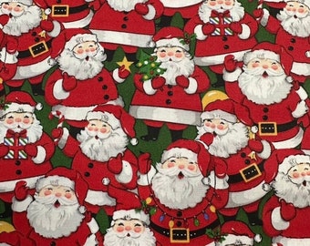 Fabric Traditions Packed Jolly Santas FAT18316-G cotton fabric