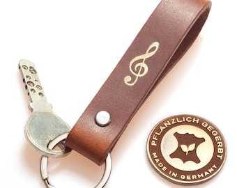 Leather keychain, vegetable-tanned – brown – treble clef gold – gift for musicians – handmade in Northern Germany