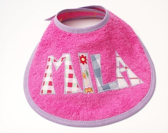 from 22,00 Euro: Frottee baby bib with name, personalized with letter applique - pink