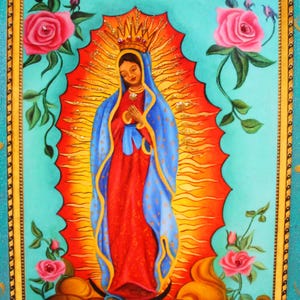 May include: A vibrant painting of a religious figure, adorned in a red dress and blue cloak, with a golden halo. Pink roses and green vines frame the figure against a turquoise background, within a gold-trimmed frame.