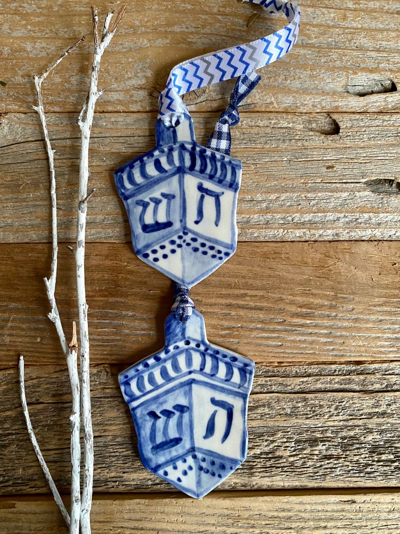 One dreidel ornament. Blue and white delftware ornament. Handmade porcelain hanging dreidel. USA image 1