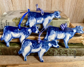 One cow ornament, delftware  porcelain ornament, bovine blue and white. Handmade ornament, USA.