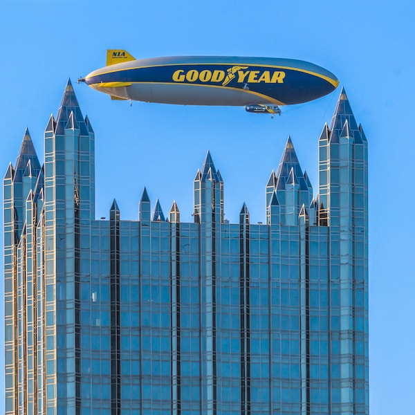 PPG Place frames the Goodyear Blimp - Pittsburgh skyline - Various Prints