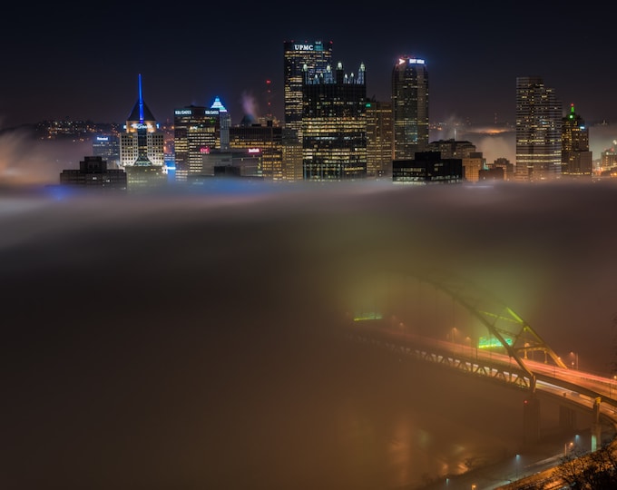 Pittsburgh is engulfed in fog as the Ft. Pitt Bridge glows in the early morning - Metal Print