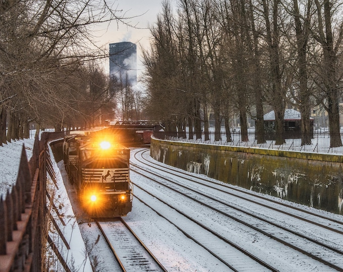 A train passes through a snow covered North Side of Pittsburgh - Various Prints