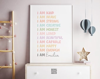 May include: A printable poster with the text "I am" followed by a list of positive affirmations in rainbow colors, ending with "I am Emilia".