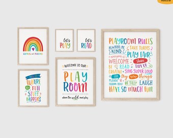 May include: A collection of framed playroom wall art. The art includes a rainbow, phrases like "Let's Play" and "Let's Read", and a sign with playroom rules. The color palette is bright and cheerful, with a variety of fonts.