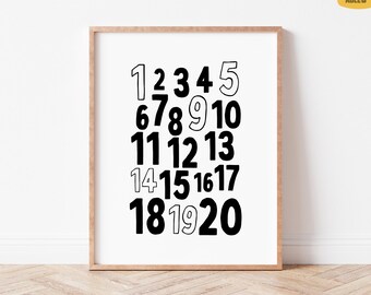 May include: A framed print featuring the numbers 1 through 20 in a bold, black font against a white background. The numbers are arranged in a grid, with a wooden frame. The print is designed for educational or decorative purposes.