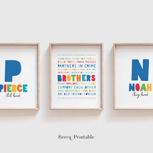 May include: Three framed prints with colorful text and illustrations. The prints feature the letters P and N, the names Pierce and Noah, and the phrase "Brothers". The text also includes phrases like "Partners in Crime" and "Best Friends Forever".