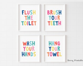 Może przedstawiać: Cztery kolorowe, drukowane tabliczki z przypomnieniami do łazienki. Tabliczki brzmią: "Flush the Toilet", "Brush Your Teeth", "Wash Your Hands" i "Hang Your Towel".