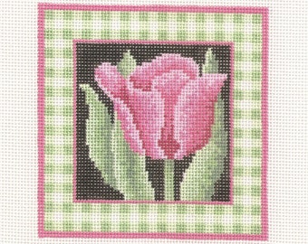May include: A pink tulip with green leaves is framed by a green and pink gingham border.