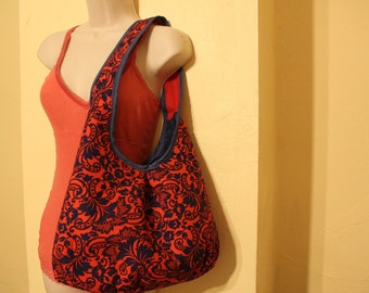 Red and blue floral print pleated purse