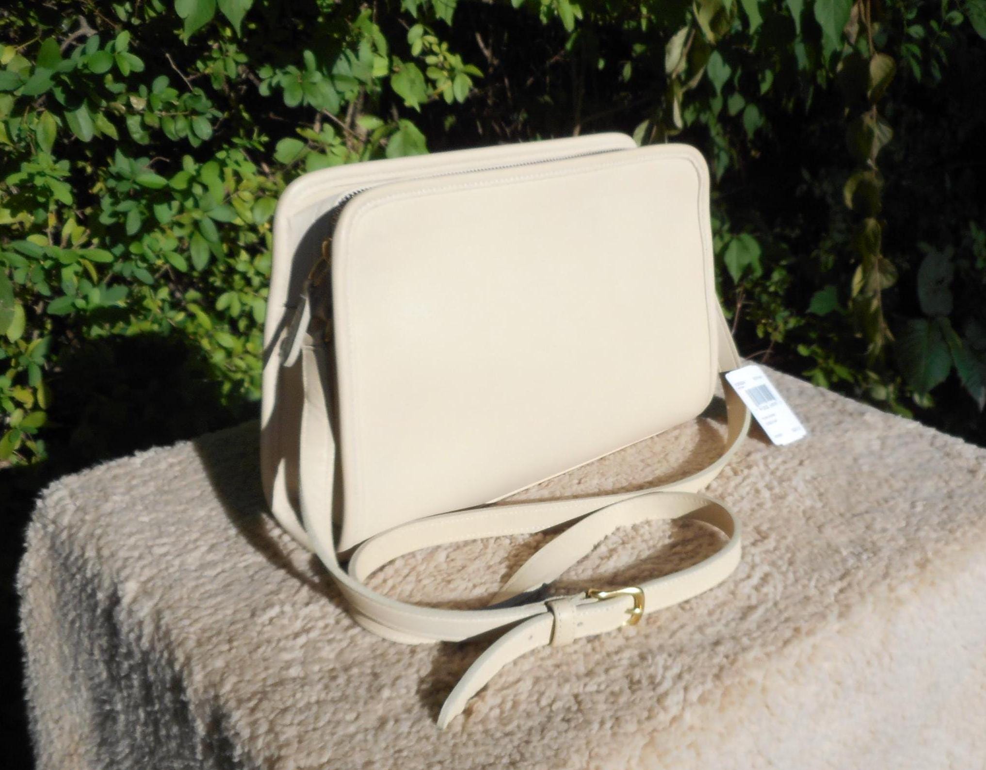 The bay coach crossbody deals