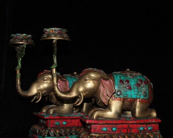 N1493 Una coppia di candelieri vintage a forma di elefante turchese con intarsio in ottone tibetano