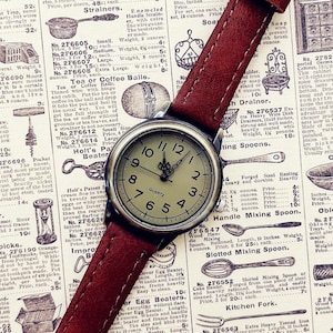 Vintage rektangulär damklocka, brunt läderarmband, kvartsarmbandsur