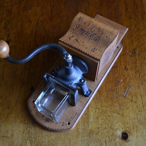Vintage Garantiert Wall Mount Coffee Grinder Mill Hand Engraved Wood and Cast Iron from Germany in Excellent Condition