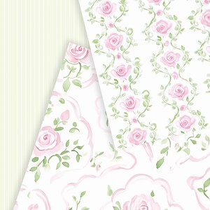 May include: Two sheets of white paper with a pink and green floral pattern. The pattern on the left sheet features pink roses with green leaves and stems. The pattern on the right sheet features pink roses with green leaves and stems arranged in a repeating pattern.