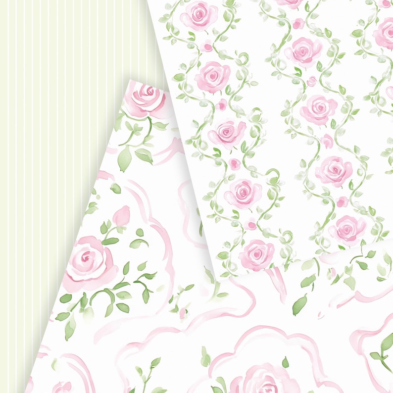 May include: Two sheets of white paper with a pink and green floral pattern. The pattern on the left sheet features pink roses with green leaves and stems. The pattern on the right sheet features pink roses with green leaves and stems arranged in a repeating pattern.