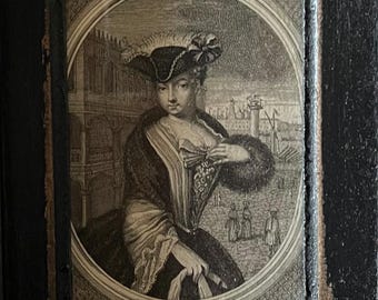 May include: An antique framed engraving featuring a woman in period attire, a feathered hat, and a fur wrap. The black and white image is set against a backdrop of a building and figures, with the text "L'Hyver" at the bottom.