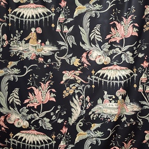 May include: A black fabric with a repeating pattern of pink and green flowers, birds, and umbrellas. The pattern is intricate and detailed, with a traditional Chinese aesthetic.