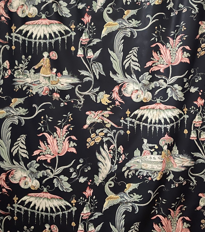 May include: A black fabric with a repeating pattern of pink and green flowers, birds, and umbrellas. The pattern is intricate and detailed, with a traditional Chinese aesthetic.