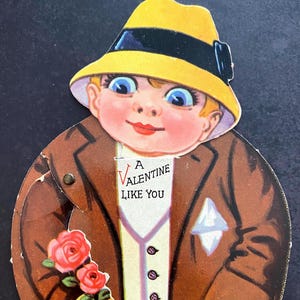 1935 movable Valentine. Adorable! Googly eyes