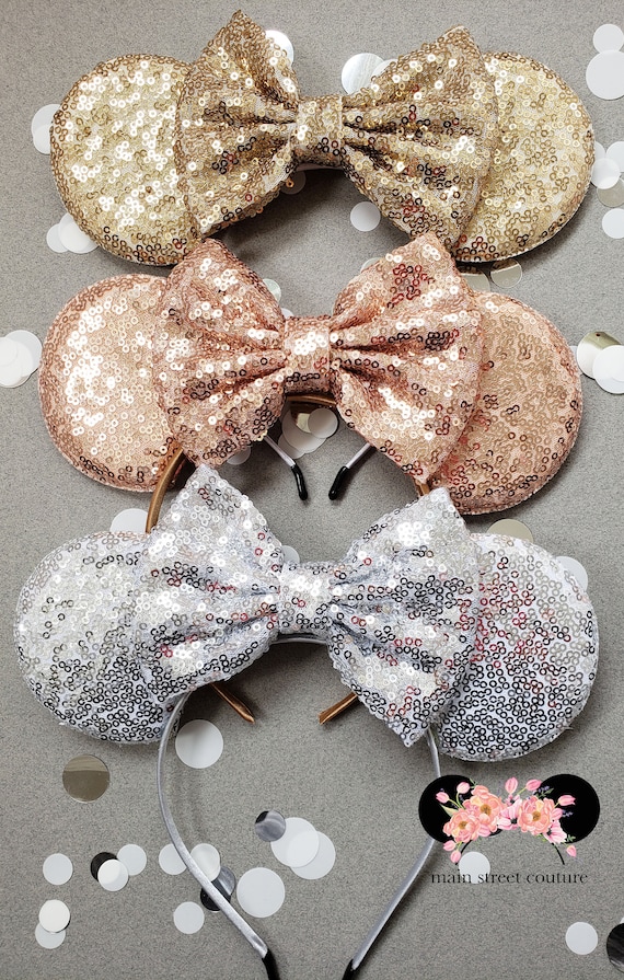 Disney Gold Sequin Minnie Ears Headband with Metallic Bow Amazon.com: Disney MRGSE Minnie Sequin Ear Headband with Bow  main image 2