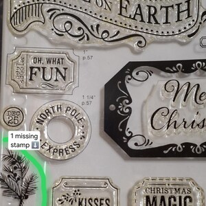 May include: A clear photopolymer stamp set featuring holiday-themed designs including a banner with the text PEACE ON EARTH, a ticket labeled OH, WHAT FUN, a circular NORTH POLE EXPRESS stamp, a DEC 25 circle, and labels reading CHRISTMAS MAGIC and KISSES.