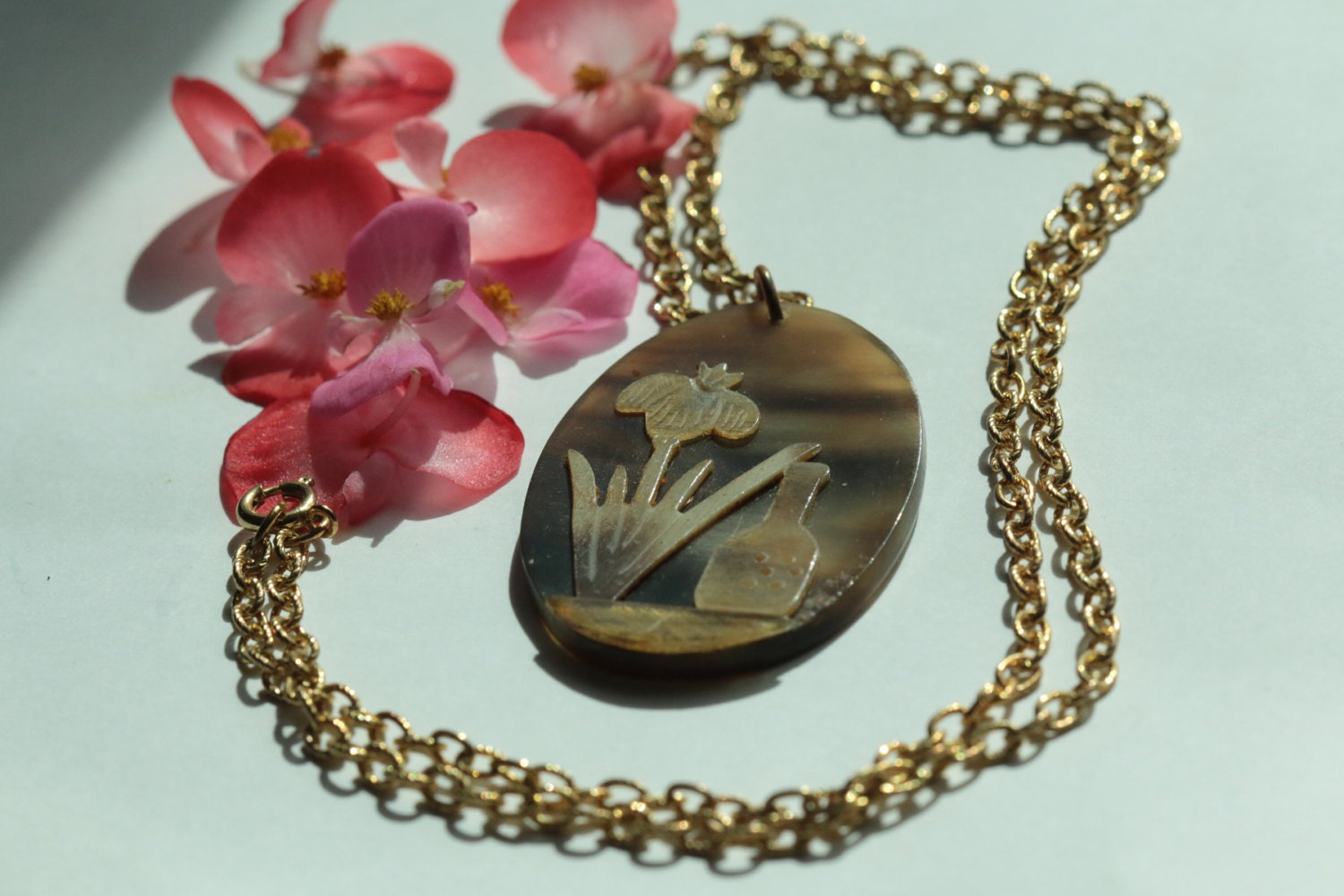 Vintage horn carved pendant with Applied flowers