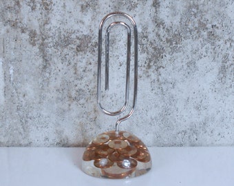 Chrome Paperclip with Floating Pennies in Lucite Base