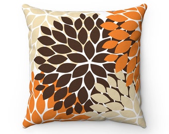orange and beige pillows