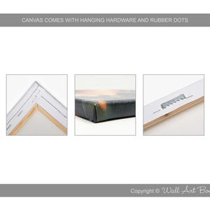 May include: Close-up of a canvas print with a wooden frame. The canvas is stretched over the frame and secured with staples. The frame has a hanging hardware attached to the back.