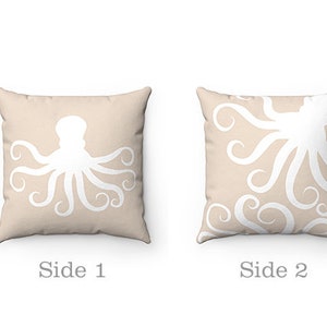 May include: Two-sided throw pillow with a white octopus silhouette on a beige background. One side features a single octopus, while the other side has a repeating pattern of octopus tentacles.