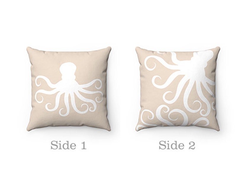 May include: Two-sided throw pillow with a white octopus silhouette on a beige background. One side features a single octopus, while the other side has a repeating pattern of octopus tentacles.