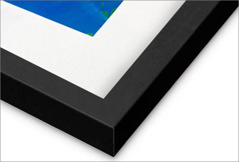 May include: A black picture frame with a white mat. The frame is made of wood and has a smooth finish.