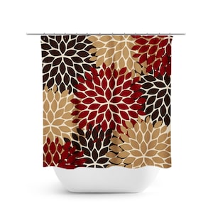 May include: A shower curtain with a floral pattern in shades of brown, red, and beige. The flowers are stylized and have a circular shape.