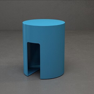 A blue cylindrical side table with a cutout on the front side.