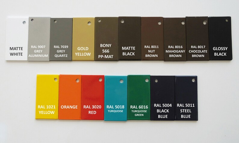 May include: A collection of color swatches in various shades, including white, gray, gold, brown, and black. Each swatch is labeled with its color name and a corresponding RAL code. Additional colors include yellow, orange, red, turquoise, green, and blue.