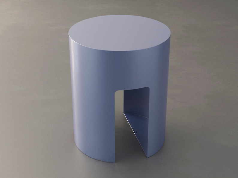 May include: A cylindrical, light blue side table with a cutout on one side. The table has a smooth, matte finish and a simple, modern design. The table is approximately 18 inches tall and 14 inches in diameter.