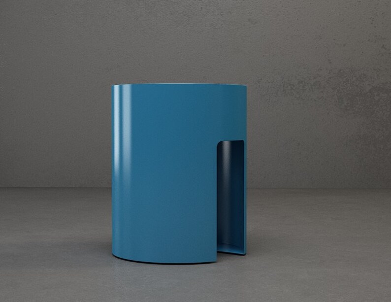 A blue cylindrical side table with a cut-out on one side.