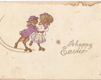 Antique Easter postcard, "A Happy Easter", embossed, couple of rabbits rollerskating, blank back