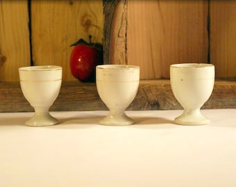 Three vintage white porcelain eggcups, Made in Japan, gold overlay