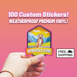May include: A pink and yellow sticker with a cartoon dog in front of a mountain scene. The sticker says "NYDECALS.COM" and "FREE SHIPPING".