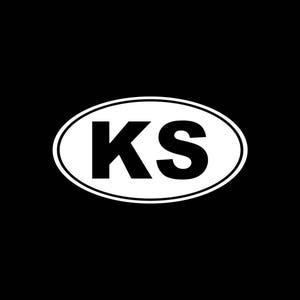 May include: White oval sticker with the letters "KS" in black.