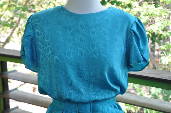Classic 80's turquiose peplum dress