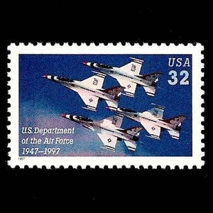 May include: A US Postal Service stamp commemorating the 50th anniversary of the US Department of the Air Force. The stamp features a blue background with four F-16 fighter jets flying in formation. The stamp is valued at 32 cents.