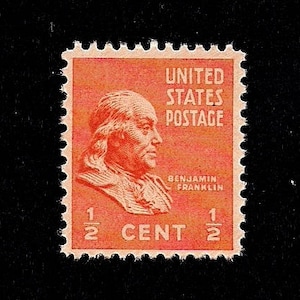 May include: A red United States postage stamp featuring a portrait of Benjamin Franklin with the text "UNITED STATES POSTAGE" and "BENJAMIN FRANKLIN" and the denomination "1/2 CENT".