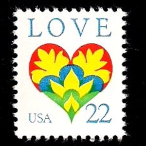 May include: A vintage US postage stamp with a red, yellow, and blue heart design. The stamp says "LOVE" and "USA 22".